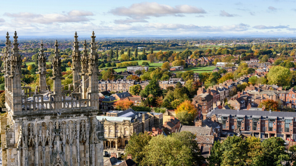 View of church spires and the city of York, England from atop York Minster