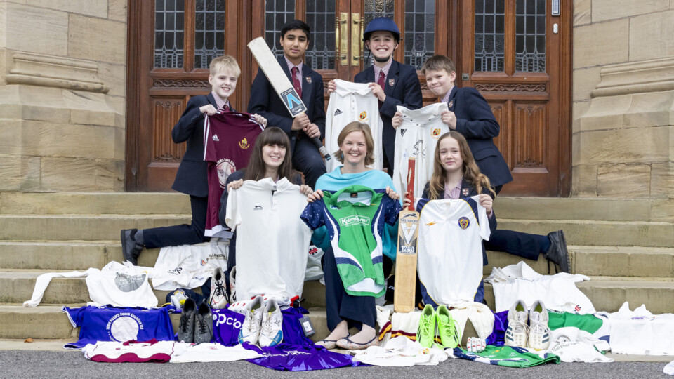 Bradford Grammar School Head of Year 7 Emma Tomlinson (C) and pupils support Action for Sport