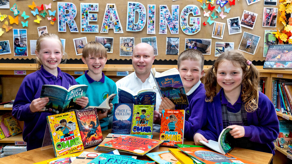 Daniel Marr, Commercial Director of Airedale Group with pupils of Sutton-in-Craven Community Primary School