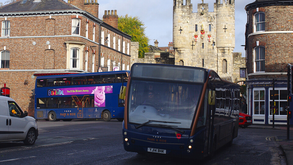 EV buses at Blossom St with Micklegate Bar in background