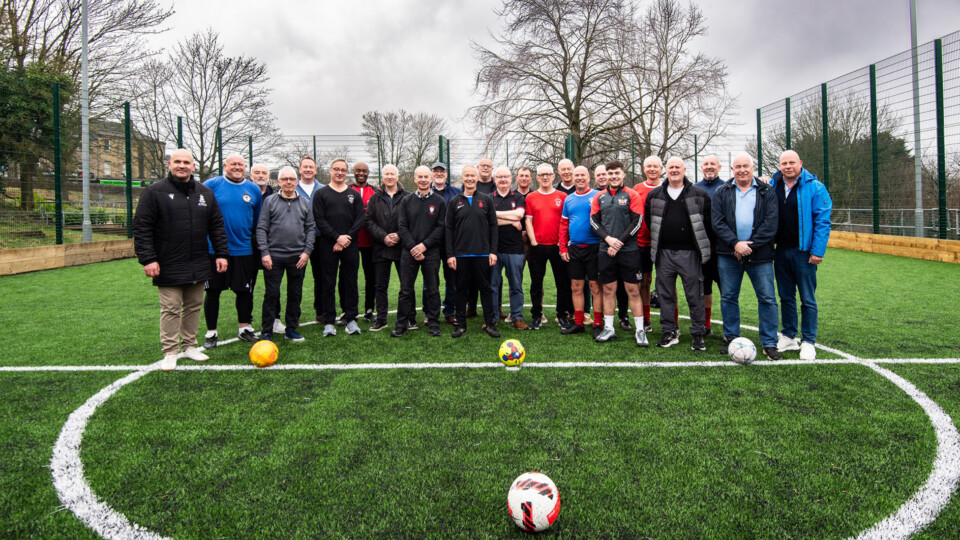 The Football Club Old Boys squad line up with Davide Longo (far left), Chief Commercial Officer at Bradford City