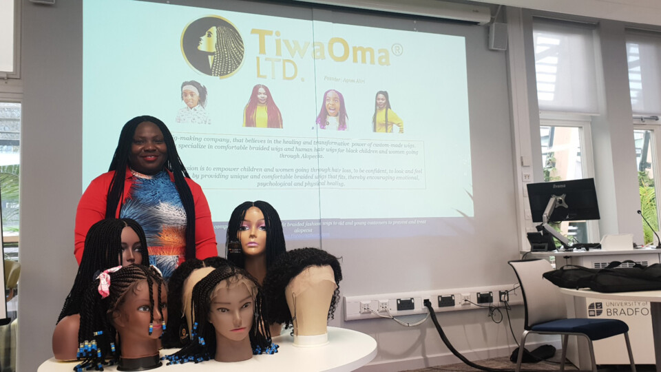 Agnes Aliri, who has been supported through BREE for TiwaOma, a business which creates wigs for black children and women experiencing hair loss. Images credit: University of Bradford