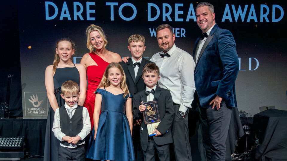 2024's Dare to Dream Award Winner Freddie McDonald and family, joined by the Burrow Family, and award sponsor Jack Phillips from David Lloyd copy