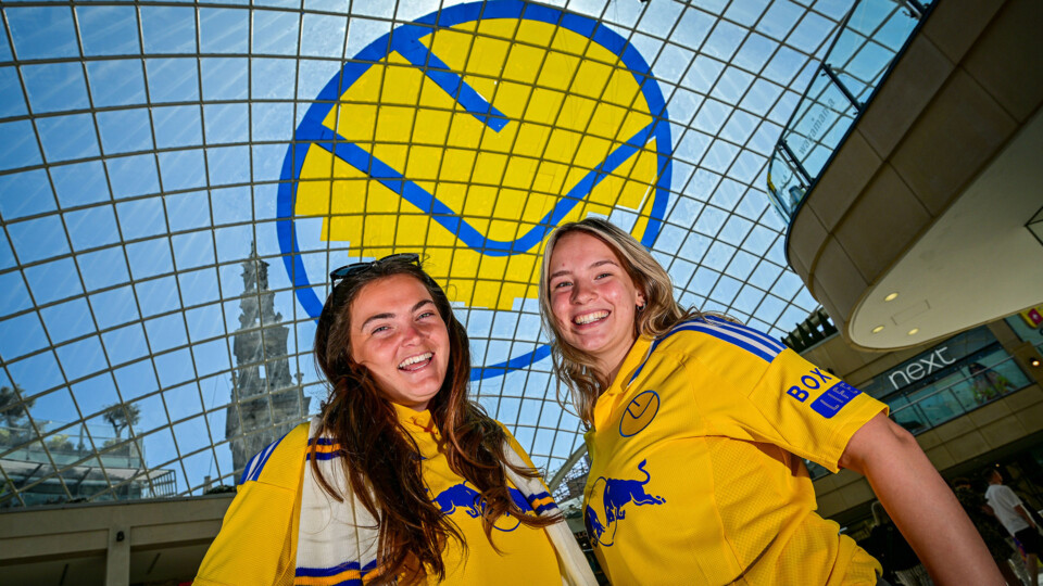 Trinity Shpping Centre celebrates Leeds going up with a mural on the roof, City fans LtR Stella Gillespie 20, &amp; Hollie Smith 19.
