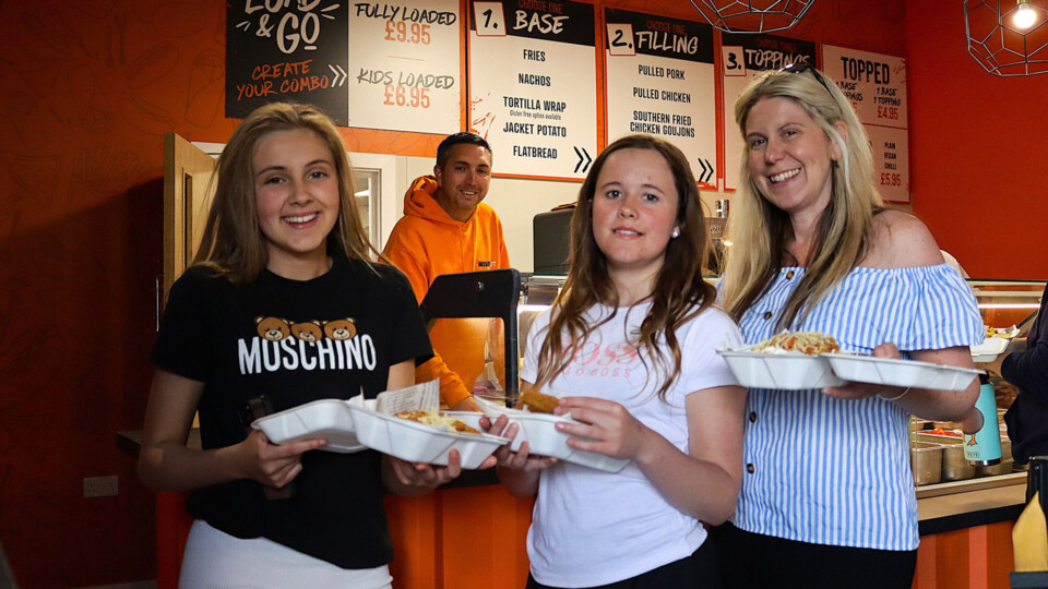 Tingley catering assistant Sarah Mark, right, with her guests