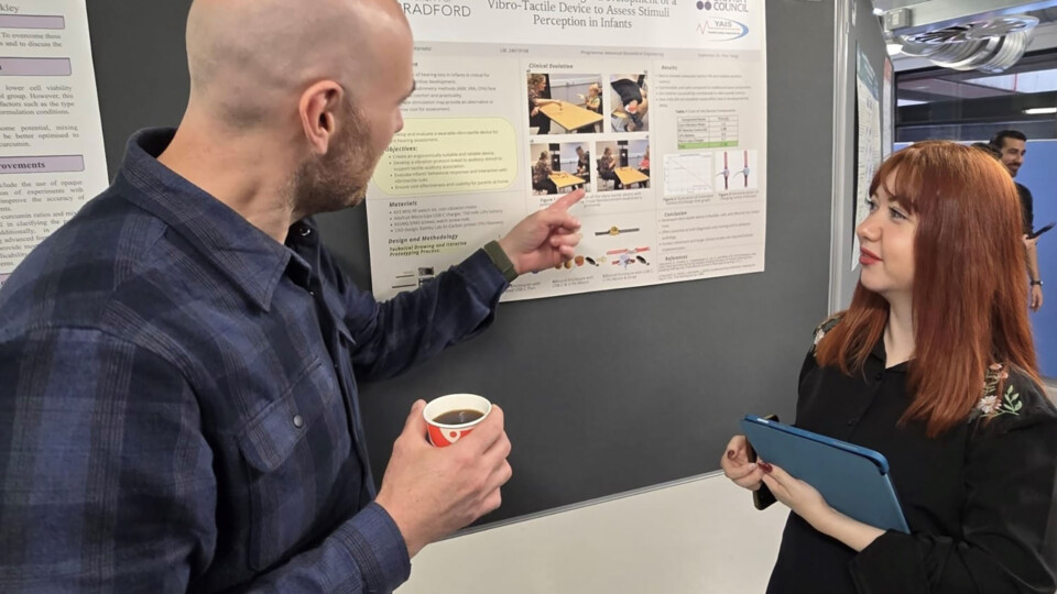Ece Karadal shows off her research project work at a University of Bradford poster event. Images credit: University of Bradford