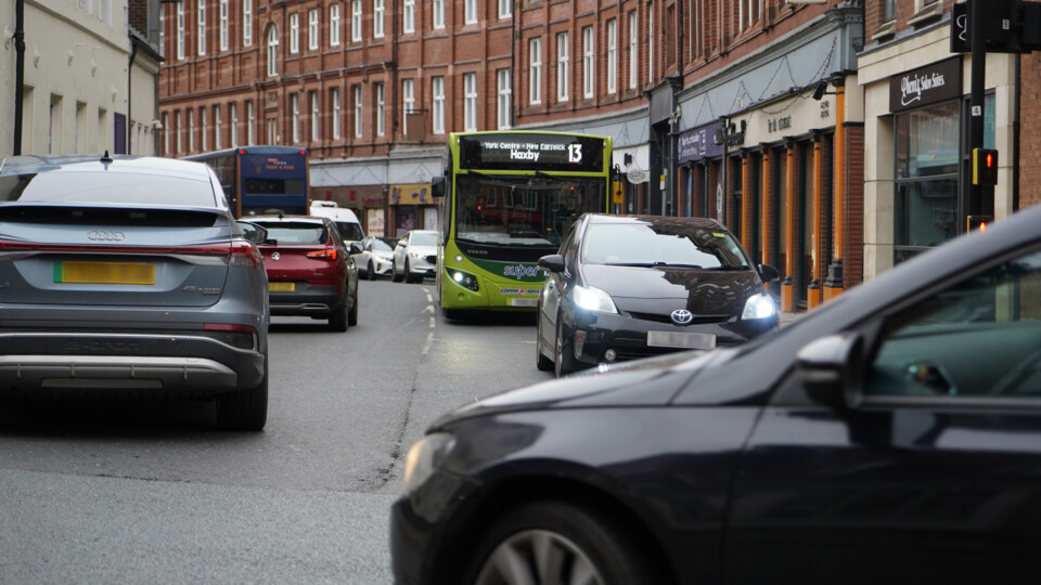 Buses caught in congestion on the Rougier Route_cropped