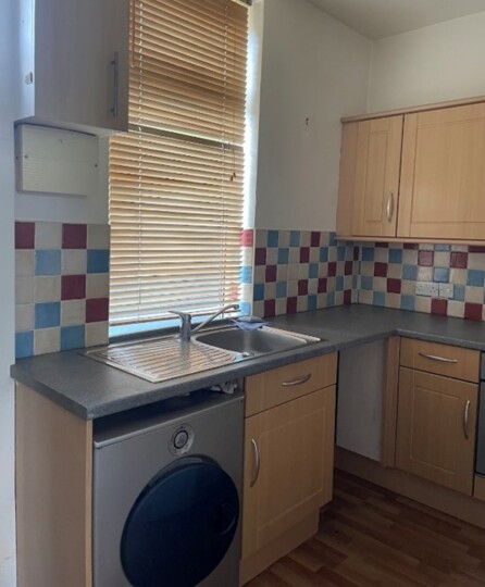 Before photo of the kitchen at 4 The Mount, Rothwell, showing the dated layout and finishes prior to renovation by Roberts Renovations Ltd.