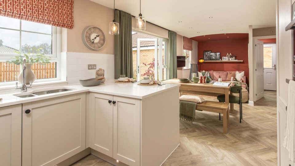 B&DWYE - 005 - The kitchen dining area in the Lamberton show home at Russet Park