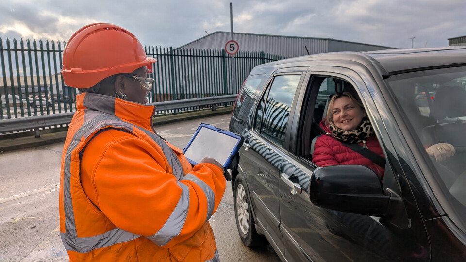 A Yorwaste member of staff 'checking in' a resident who has booked on to the new system at Hazel Court HWRC