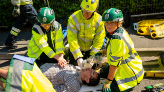 Paramedic Science students from the University of Bradford give treatment to a patient at the vehicle crash simulation.  Images credit: Kiran Metha@KM Images
