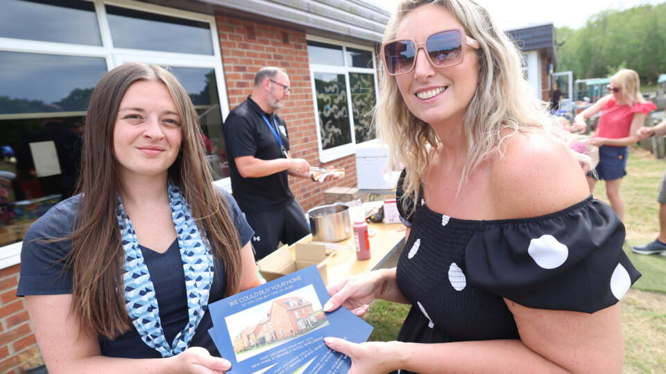 Becca Cooke, Representative from David Wilson Homes, and Kara Palmer at Elvington Church of England School Summer Fayre